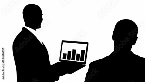 Businessman presenting data to colleague in modern office setting