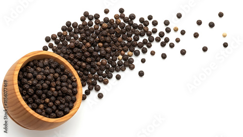 Peppercorns Spill From Wooden Bowl