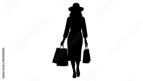 Silhouette of a stylish woman walking with shopping bags