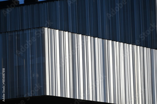 Modern office building with an interesting perforated metal facade