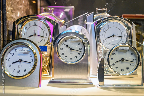 Modern analog table clocks in shop. 