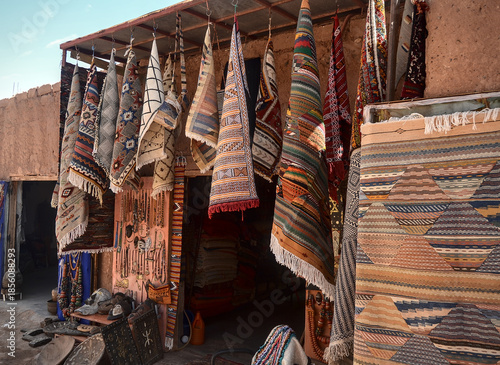 Traditional Moroccan Rugs Hanging in a Street Market