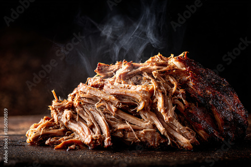 Tender pulled pork steaming hot, a barbecue classic.