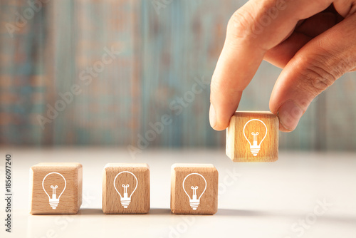 hand holding light bulb with idea icon. innovation concept