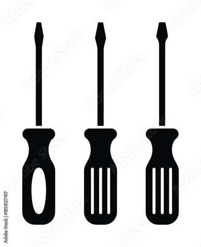 Three vector screwdrivers isolated on a plain background.