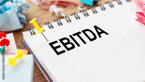Spiral Notebook With the Word EBITDA