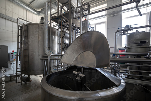 Large scale milk pasteurization tank in food plant