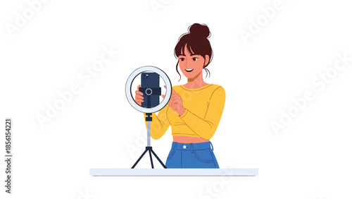 Cheerful young woman recording video content on smartphone with ring light, creating a vlog or live stream for her social media audience.