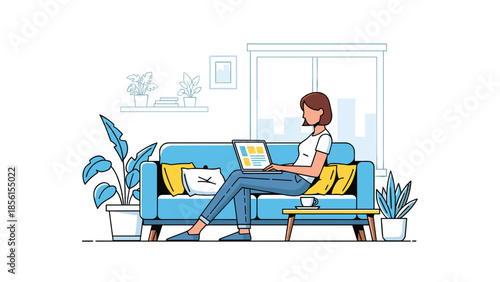 Relaxed young woman sitting comfortably on a blue sofa in her modern living room, working on a laptop with plants nearby.