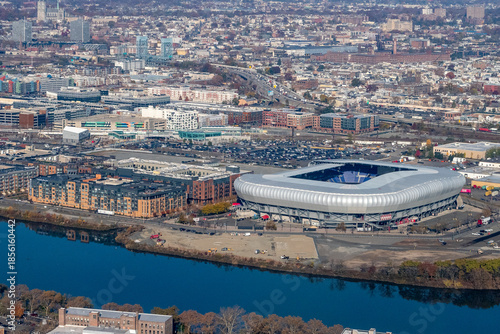 Aerial view of Harrison and Newark New Jersey with residential buildings, warehouses and the stadium