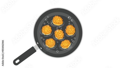 Five golden-brown, round fried food items sizzling in a hot pan with oil and bubbles, viewed from a top-down perspective.
