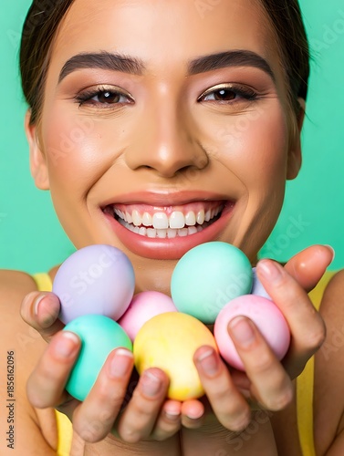 Joyful Young Woman Closeup Holding Pastel Easter Eggs in Hands Against Turquoise Background