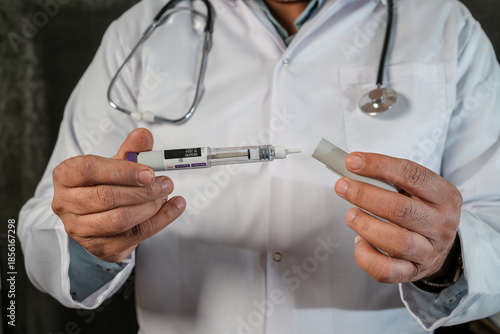 Medical doctor presenting Mounjaro tirzepatide KwikPen medication used for diabetes management and chronic weight loss