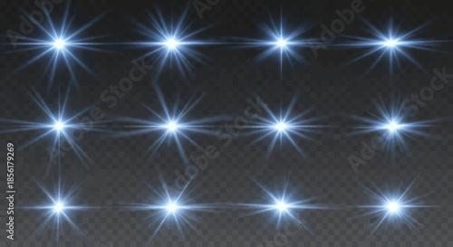 Glowing starburst lights on dark background.