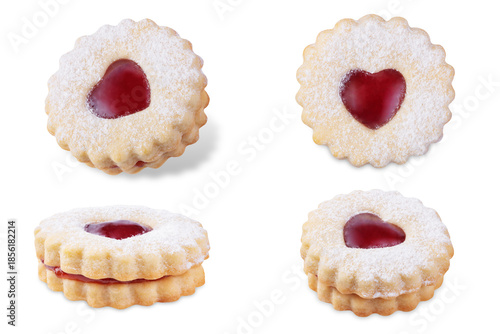 Linzer cookies with strawberry jam and heart shape topping for Valentine's day holiday on a white isolated background