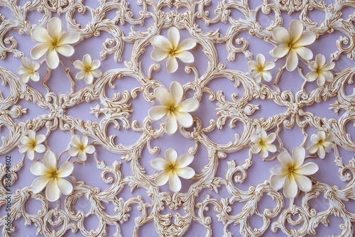 Intricate cream-colored baroque scrollwork overlays a soft lavender background adorned with delicate white blossoms.