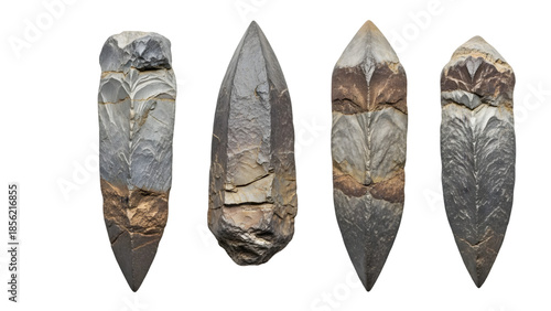 Four ancient stone arrowheads isolated on transparent background