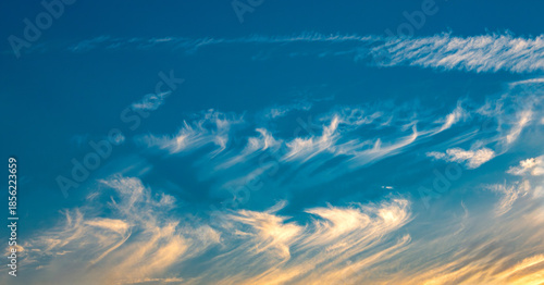 Εκτύπωση καμβά cirrus uncinus clouds in blue sky at sunset