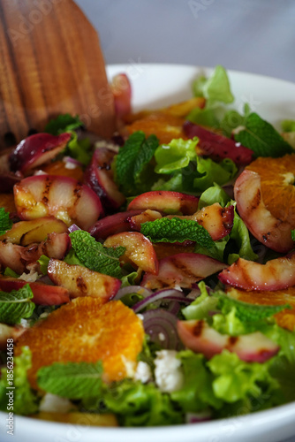 Delicious fresh summer fruit salad in a bowl