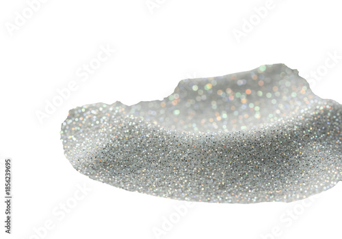 Macro shot of fine, iridescent glitter particles forming soft, undulating wave-like mounds, shimmering with ethereal colors on a transparent studio background with copy space. Abstract textural