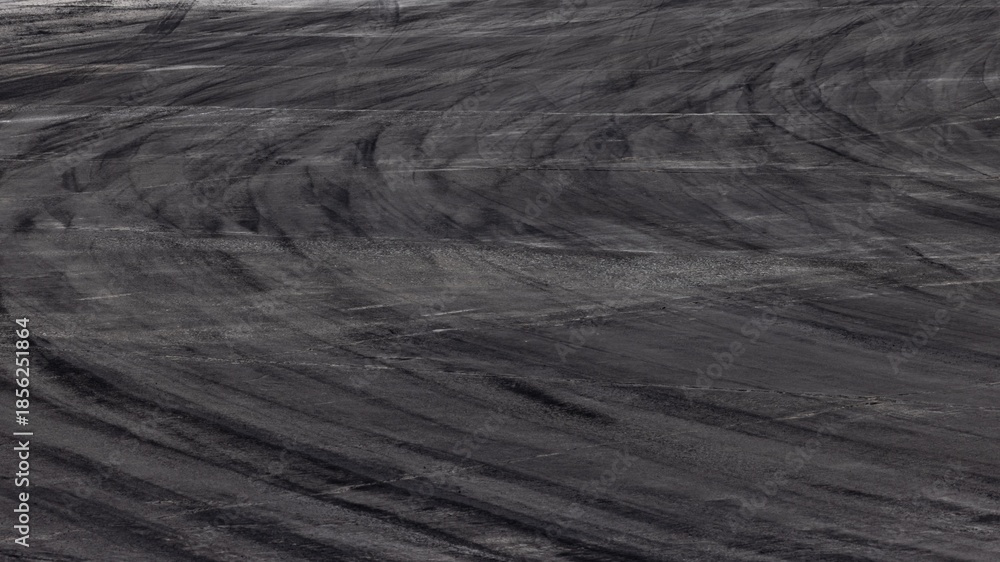 Αυτοκόλλητο abstract asphalt street road background with black tire marks on race track, Texture and background car automobile and automotive skid tire marks