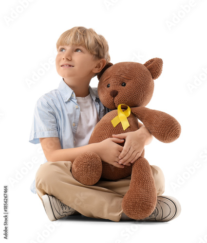 Cute boy with toy bear and ...