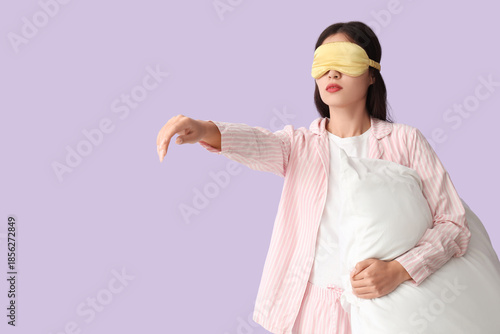 Female sleepwalker in pajam...
