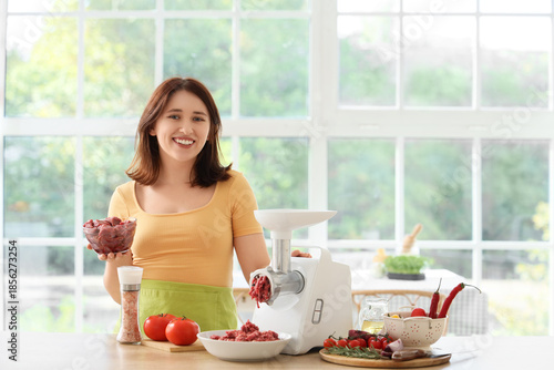 Young woman using modern me...