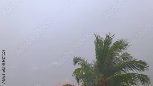 Tropical mountain mountains dramatic rainy clouds rain hazy mist Thailand.