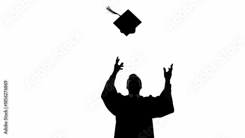 Graduate Throwing Academic Cap in Celebration.