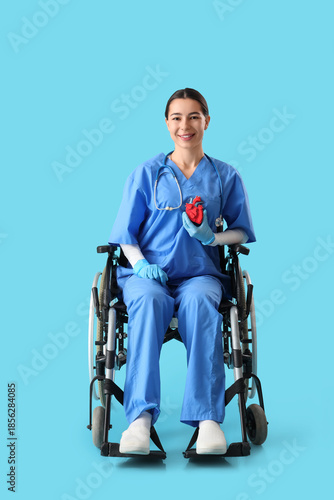Young female doctor with pa...
