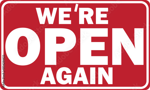 A red sign with white text "WE'RE OPEN AGAIN" indicating a business has resumed operations.