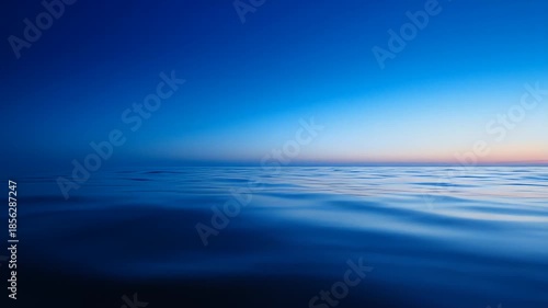 Calm Ocean Waves at Serene Sunset.