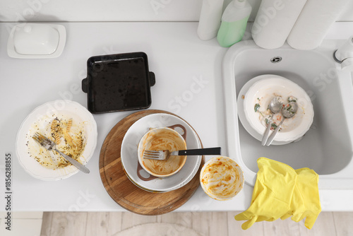 Dirty dishes on counter nea...
