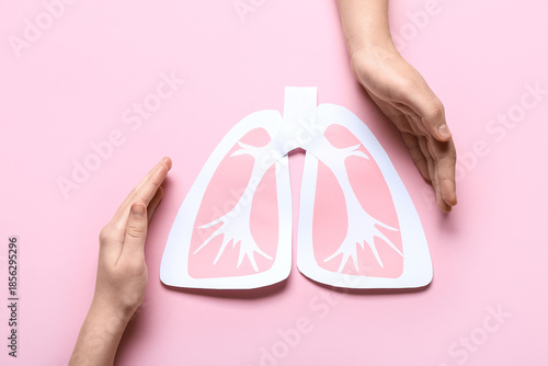 Female hands with paper lun...