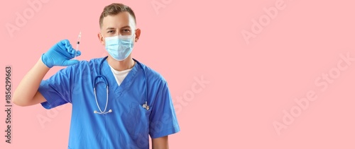 Male doctor with syringe on...