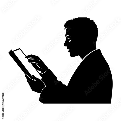 Silhouette of man using digital tablet device closely.