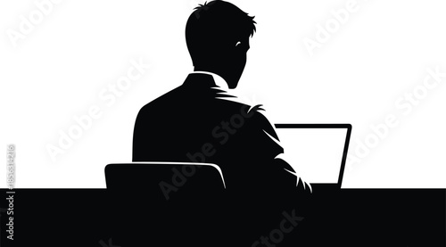 Silhouette of a professional businessman working on a laptop at a desk, back view of male employee focused on computer, office work.