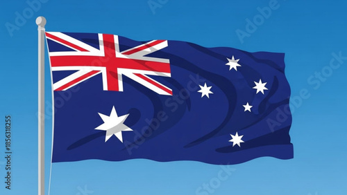 Australian flag waving on a pole against a clear blue sky with white stars and union jack in the corner symbolizing national pride and patriotism