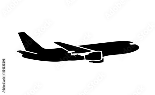 Silhouette of a large commercial airplane in flight, seen from the side.