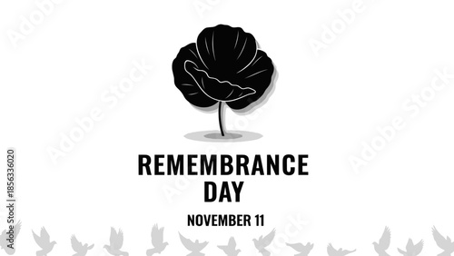 Remembrance Day November 11th with black poppy flower and dove silhouettes on white background.