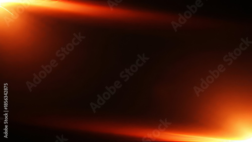 Fiery Abstract Glow Border with Vibrant Orange and Yellow Light Streaks on Dark Background