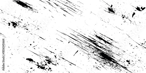 A stark abstract composition of black brushstrokes agepsnst a pure white background creating a dynamic texture