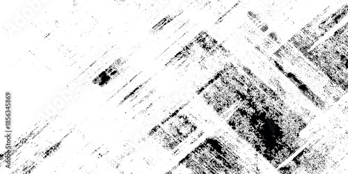 Abstract black and white texture showing bold diagonal brushstrokes creating a dynamic and somewhat chaotic visual pattern