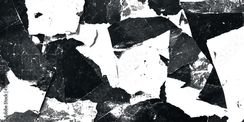 Abstract black and white texture showcasing fragmented shapes and dramatic contrasts creating a visually striking composition