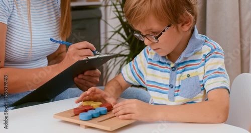 Child Engaged in Educational Activity with Teacher's Guidance