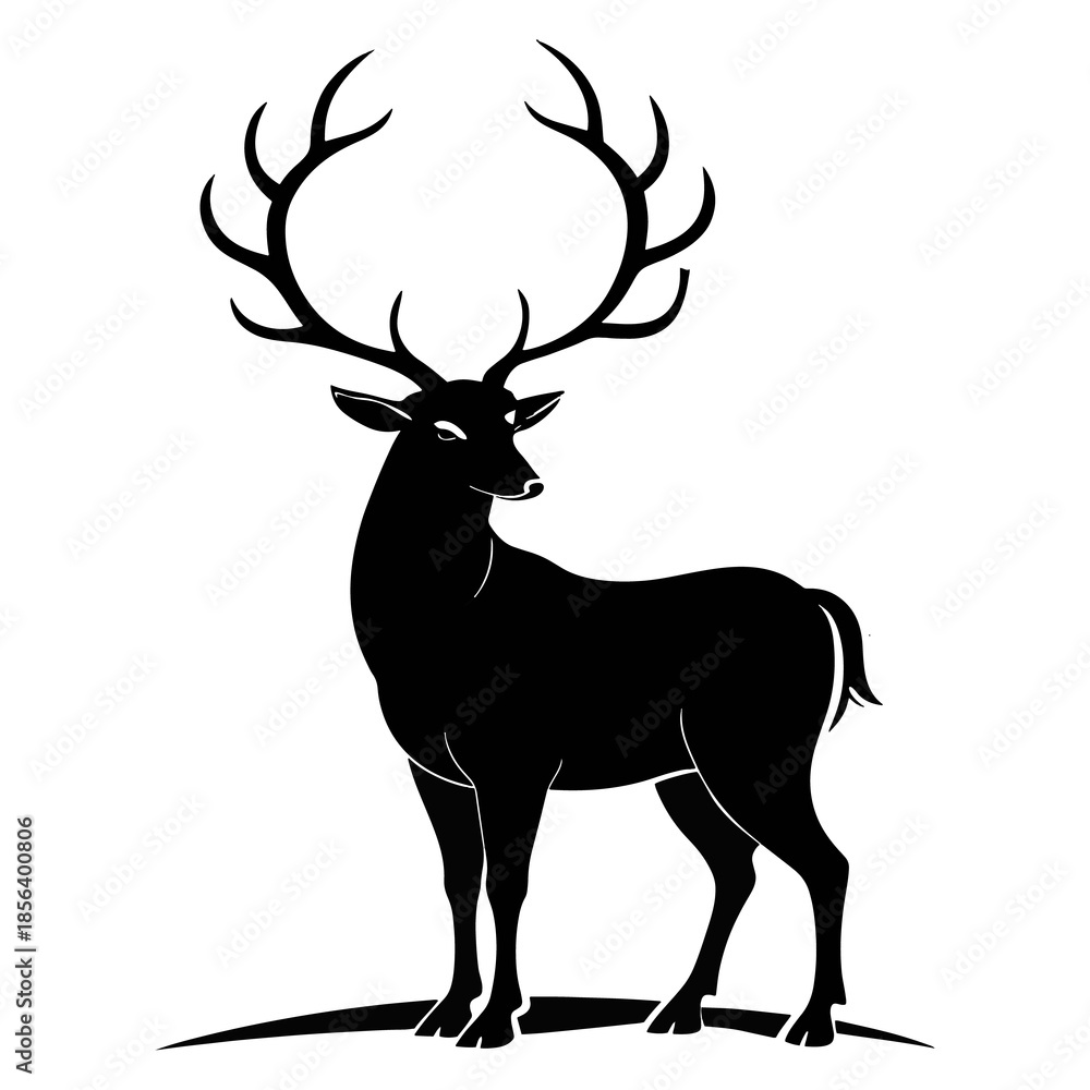 Obraz premium Majestic stag with large antlers standing on grassy ground deer animal