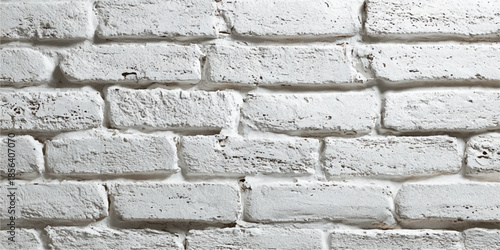 A close-up view of a white washed brick wall with visible texture and slight variations in color.