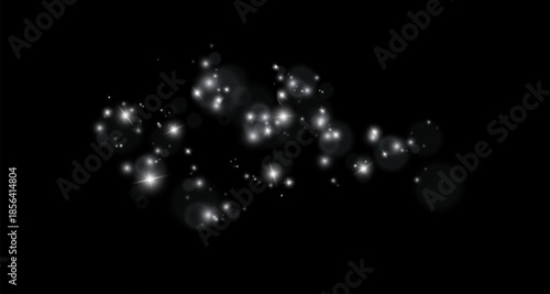 Light and white dust. Bokeh effect background . Christmas glowing dust background. Glowing light with confetti bokeh light. Crystal flare. dust background.