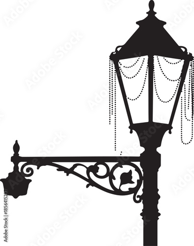 Ornate vintage  street lamp draped with Mardi Gras beads